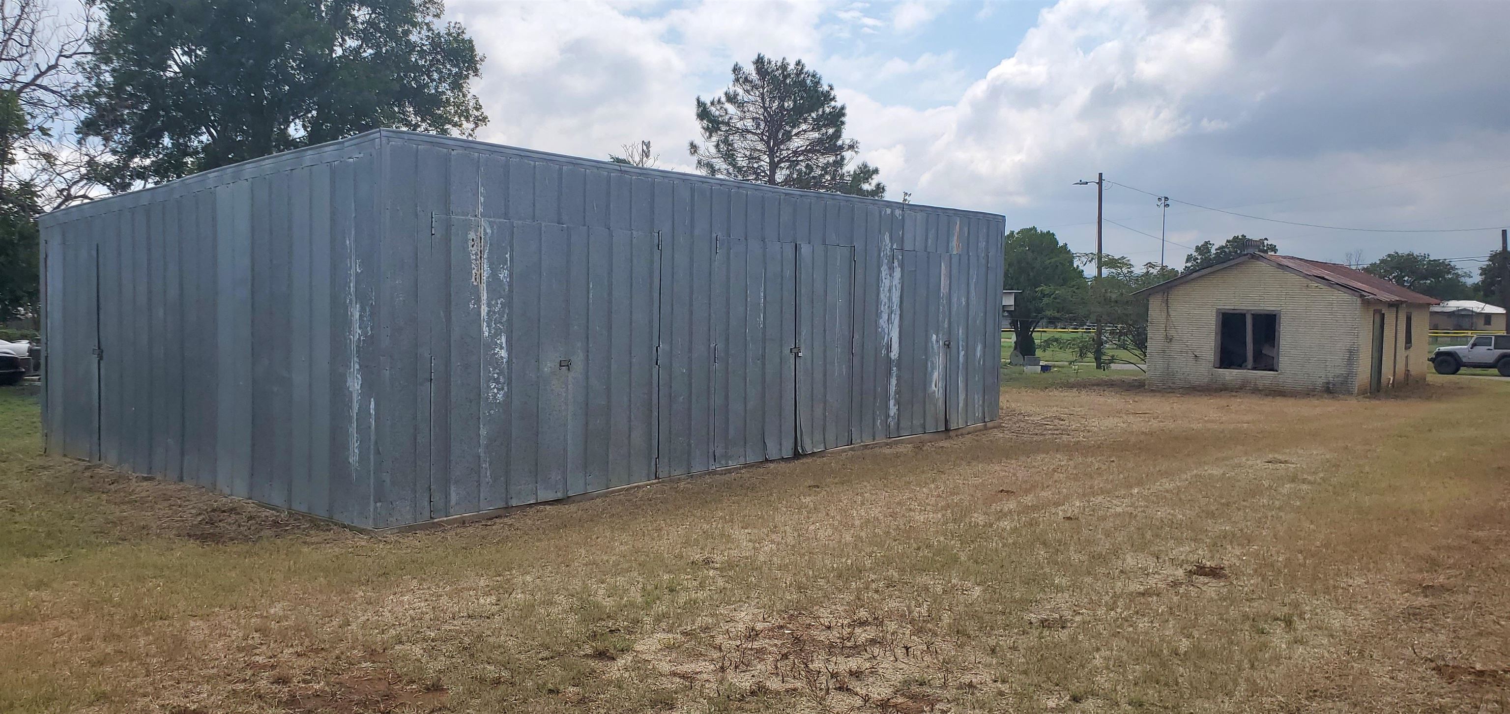 103 East Houston Street Llano, TX 78643 - Photo 1 of 7 a view of a house with wooden fence