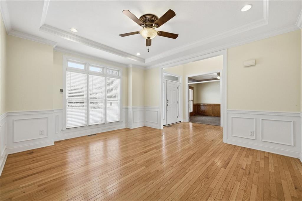 110 Timber Ridge Drive Harmony, PA 16037 - Photo 12 of 50 a view of an empty room with window and wooden floor