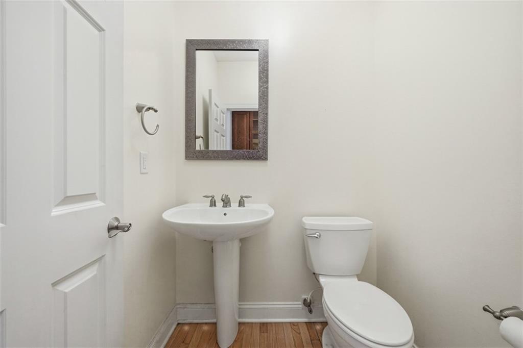 110 Timber Ridge Drive Harmony, PA 16037 - Photo 15 of 50 a bathroom with a toilet sink and mirror