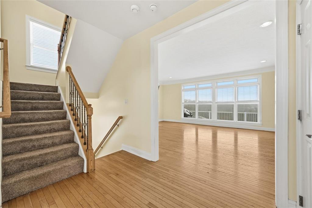 110 Timber Ridge Drive Harmony, PA 16037 - Photo 17 of 50 a view of empty room with wooden floor and fan