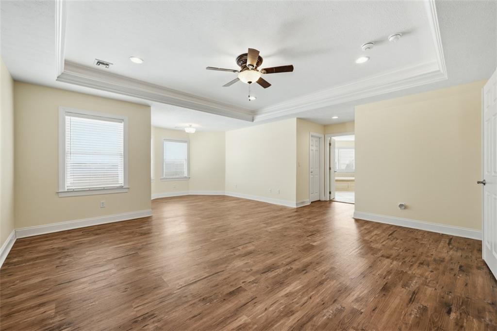 110 Timber Ridge Drive Harmony, PA 16037 - Photo 20 of 50 a view of an empty room with window and wooden floor
