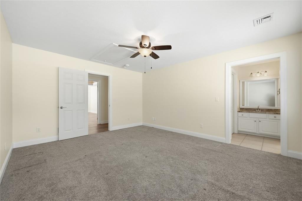 110 Timber Ridge Drive Harmony, PA 16037 - Photo 30 of 50 an empty room with fan and a ceiling fan