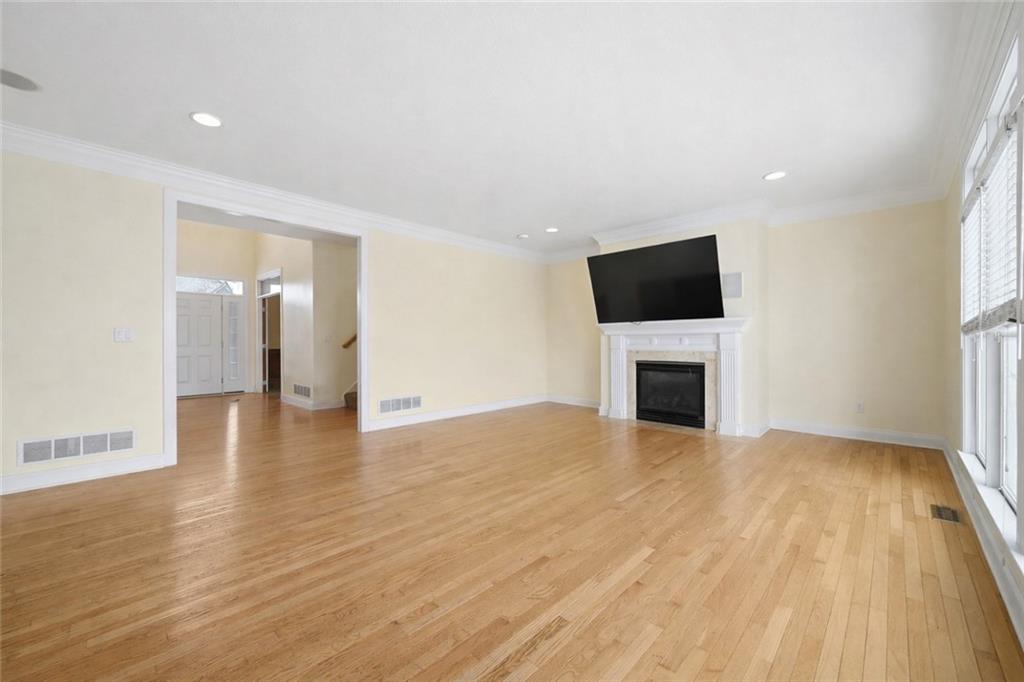 110 Timber Ridge Drive Harmony, PA 16037 - Photo 3 of 50 a view of a livingroom with a fireplace a window and a fireplace