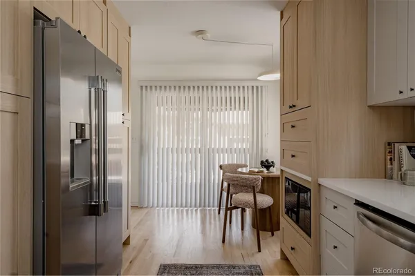 a view of a porch with wooden floor and outdoor space