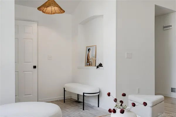 a room with a table and chairs