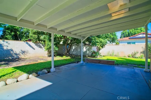 a view of a backyard with garden