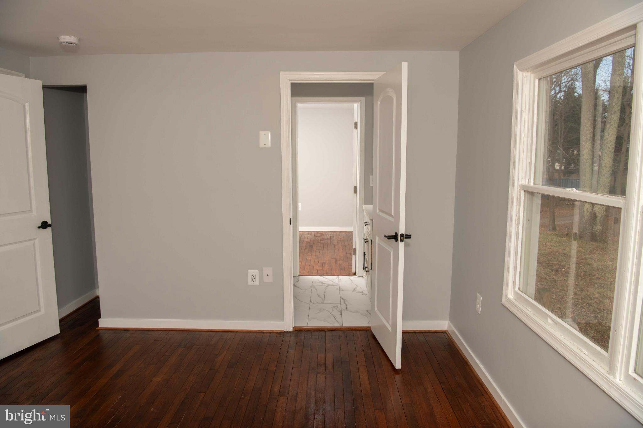 4785 Mountain Road Pasadena, MD 21122 - Photo 16 of 50 Bright and airy Bedroom #2.