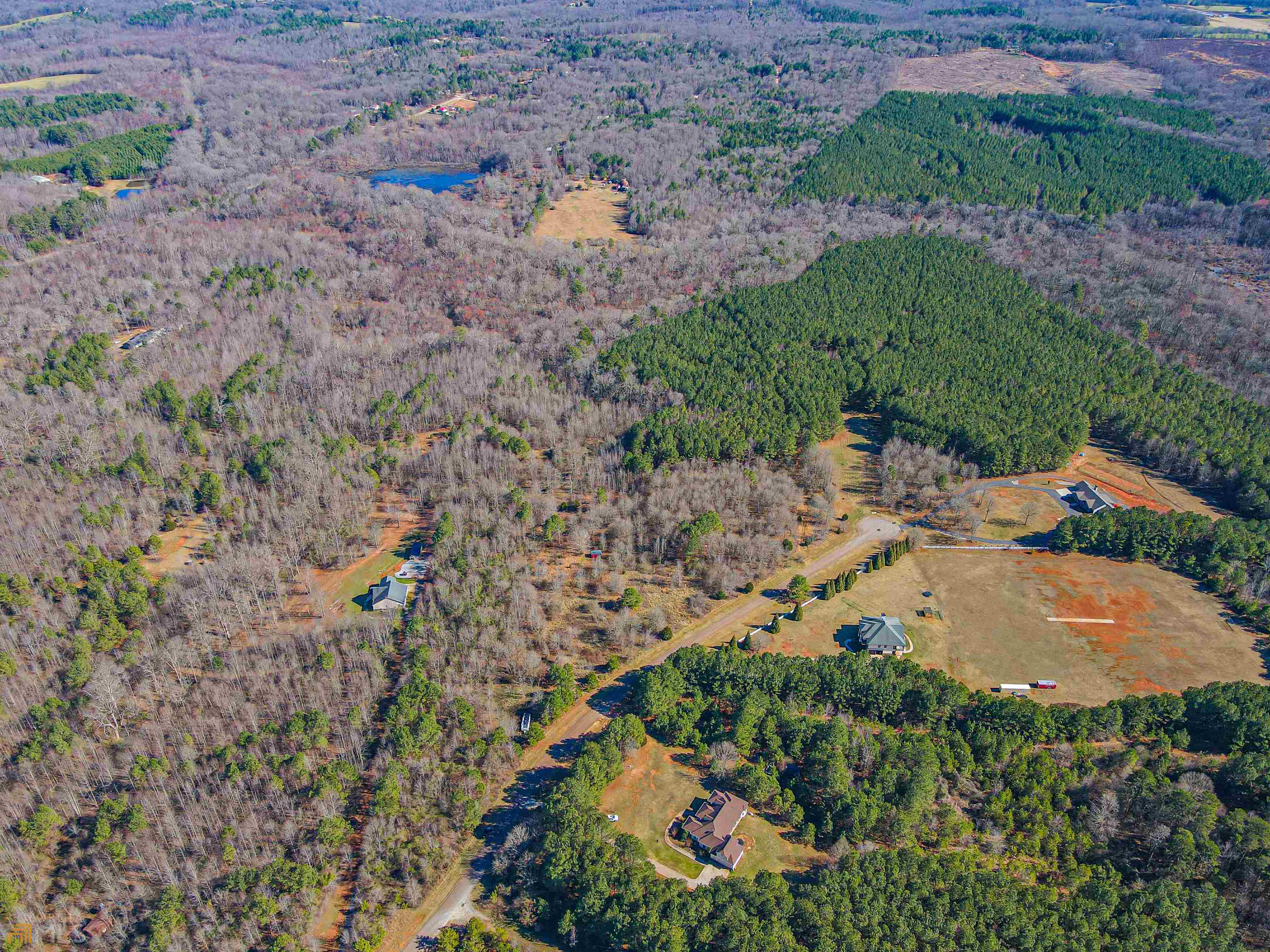 an aerial view of residential house with outdoor space