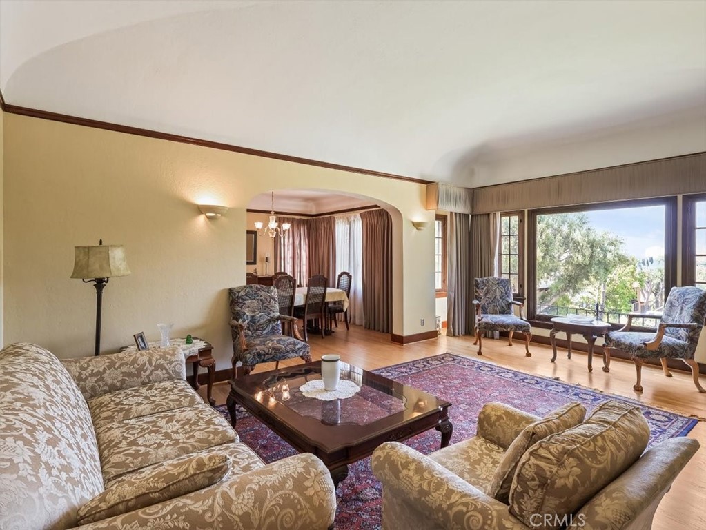 945 Rosemount Road Glendale, CA 91207 - Photo 13 of 31 a living room with furniture and a large window