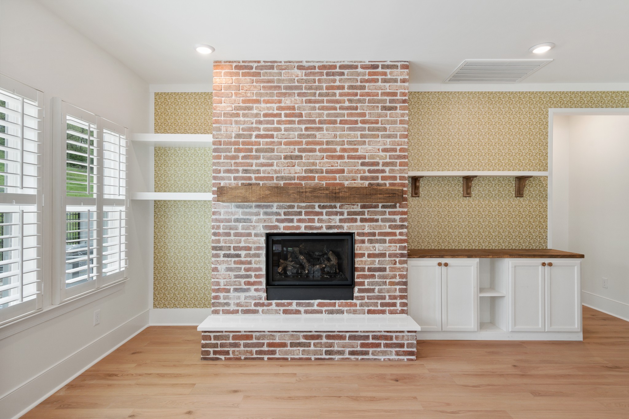 2056 Notchleaf Road Antioch, TN 37013 - Photo 14 of 42 a living room with a fireplace and a rug floor