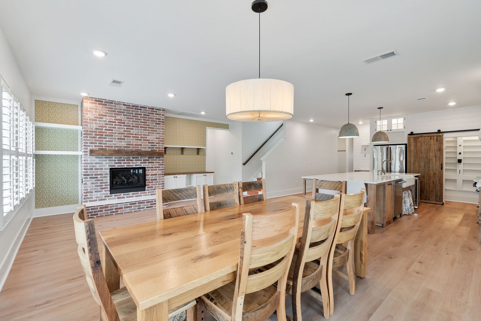 2056 Notchleaf Road Antioch, TN 37013 - Photo 15 of 42 a dining room with furniture and a kitchen view