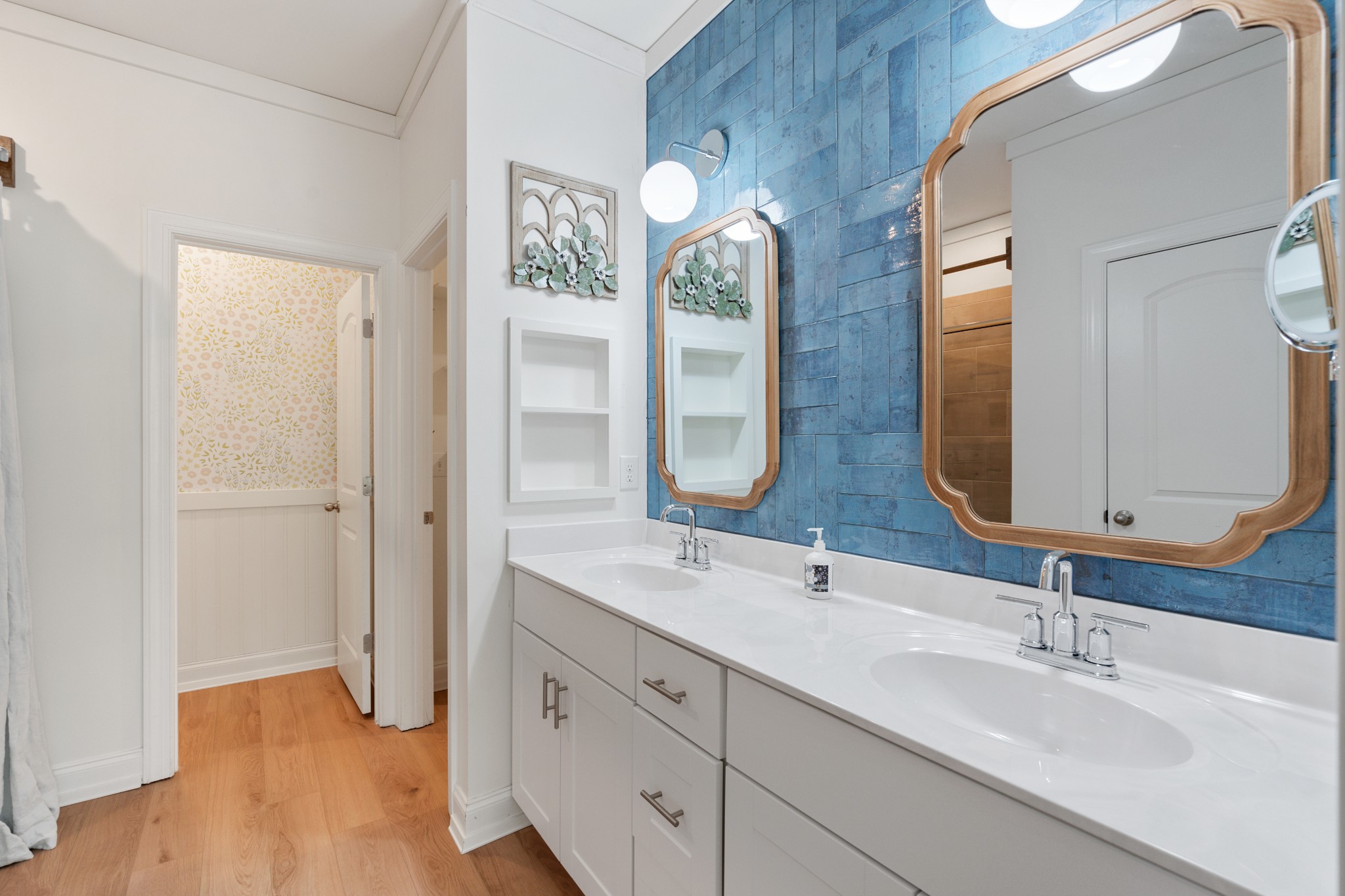 2056 Notchleaf Road Antioch, TN 37013 - Photo 18 of 42 a bathroom with double vanity sinks and a mirror