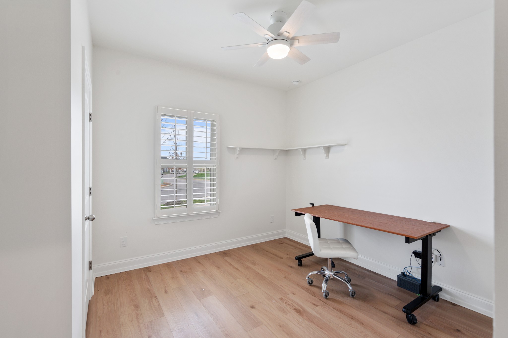 2056 Notchleaf Road Antioch, TN 37013 - Photo 22 of 42 a view of room with a window and hardwood floor