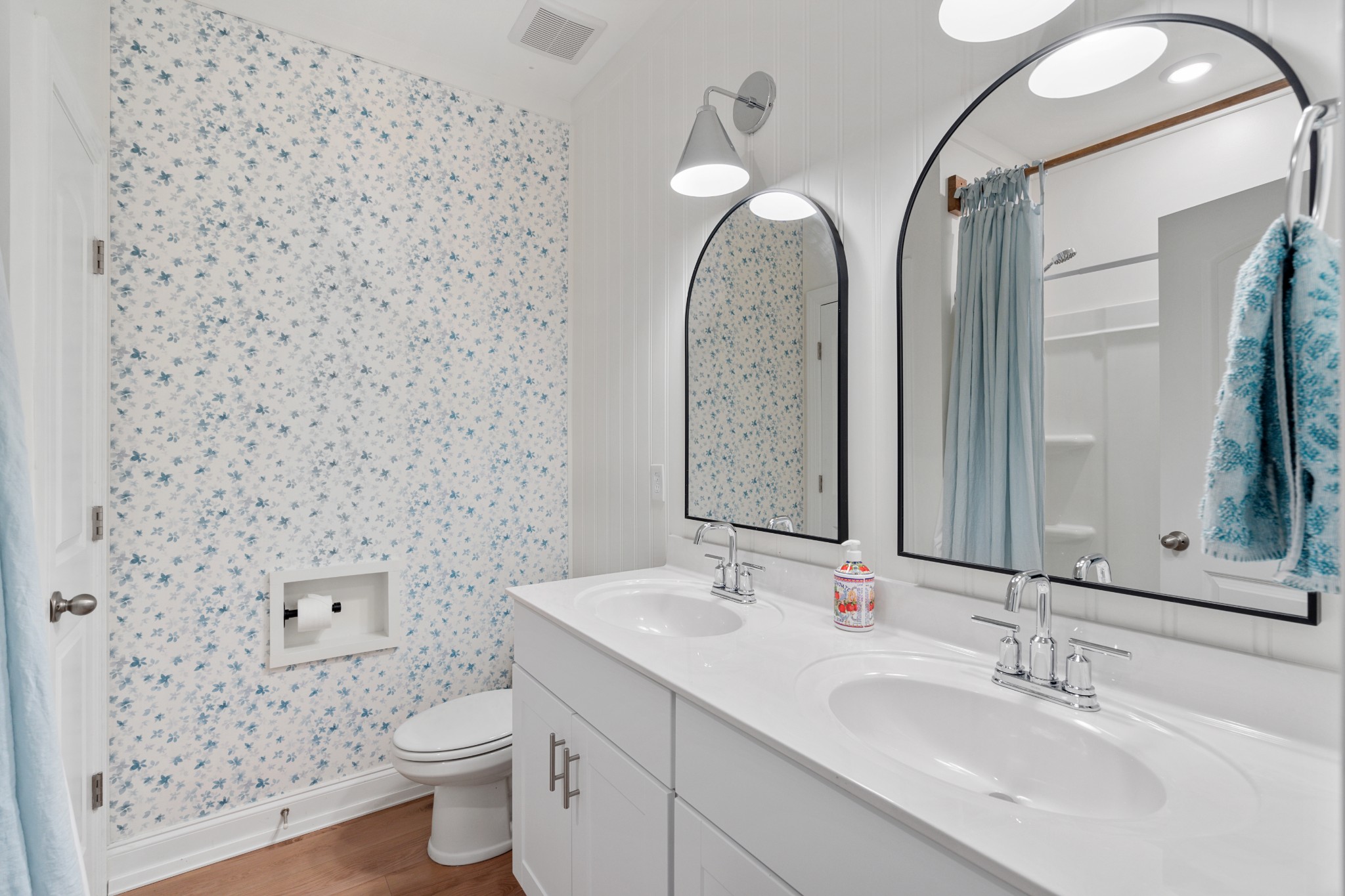 2056 Notchleaf Road Antioch, TN 37013 - Photo 23 of 42 a bathroom with a toilet sink and mirror