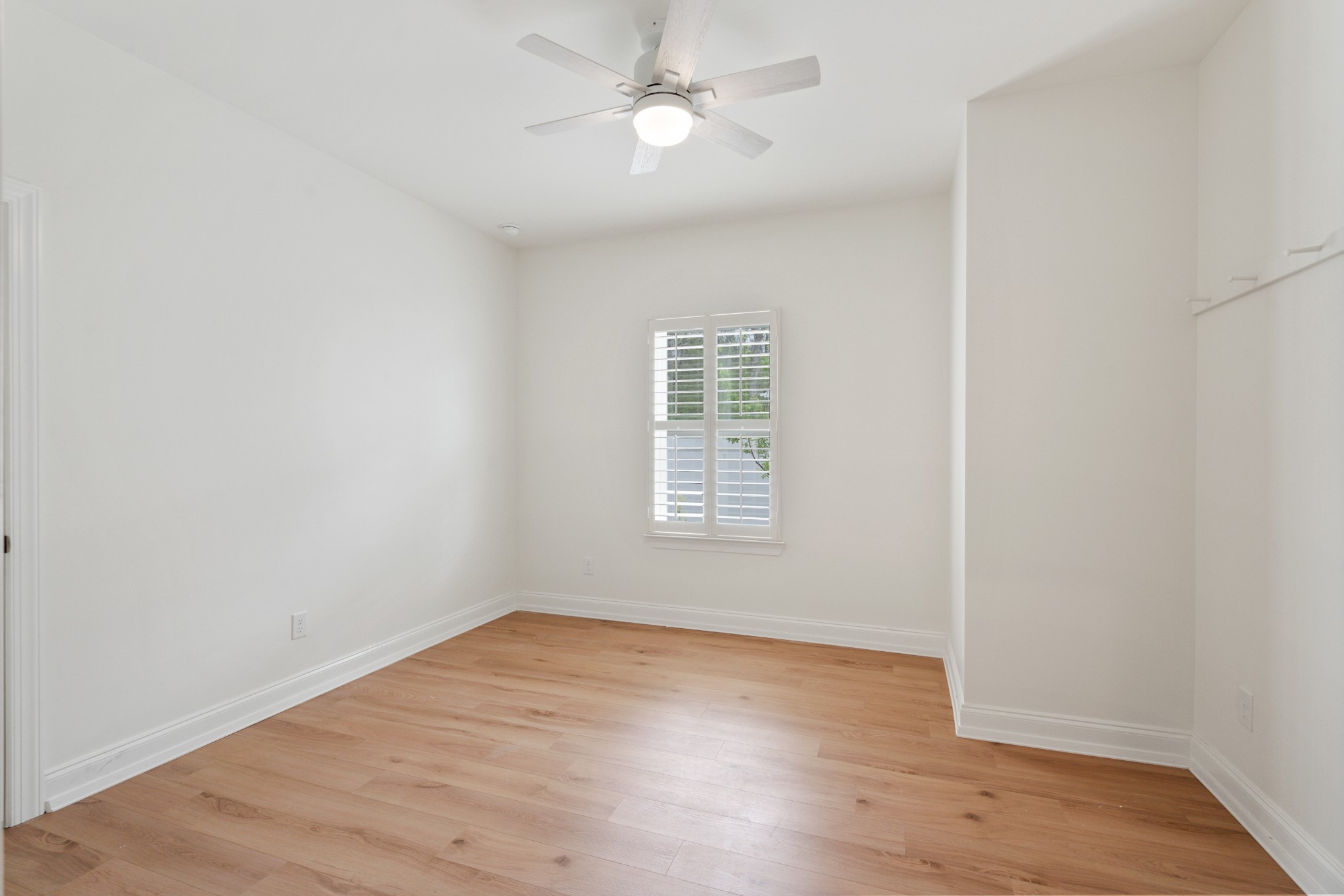 2056 Notchleaf Road Antioch, TN 37013 - Photo 26 of 42 wooden floor in an empty room with a window