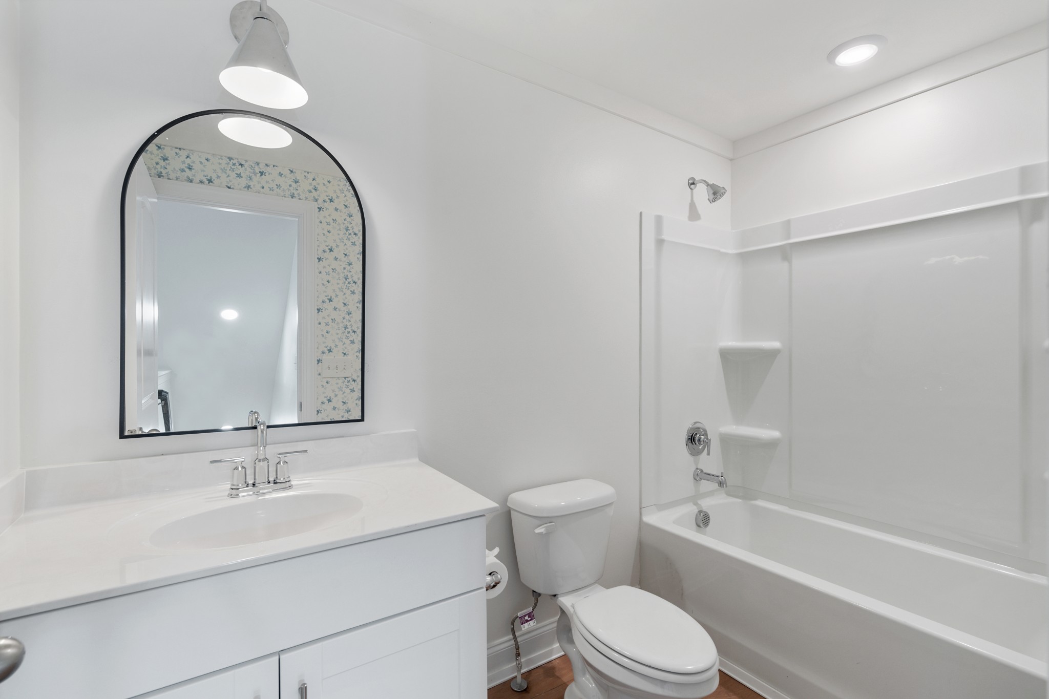 2056 Notchleaf Road Antioch, TN 37013 - Photo 30 of 42 a bathroom with a sink toilet vanity and shower