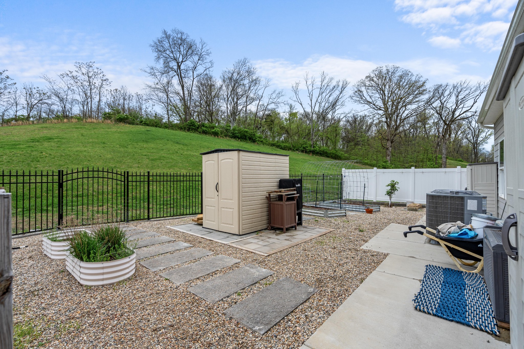 2056 Notchleaf Road Antioch, TN 37013 - Photo 34 of 42 a view of a backyard with plants and mountain view