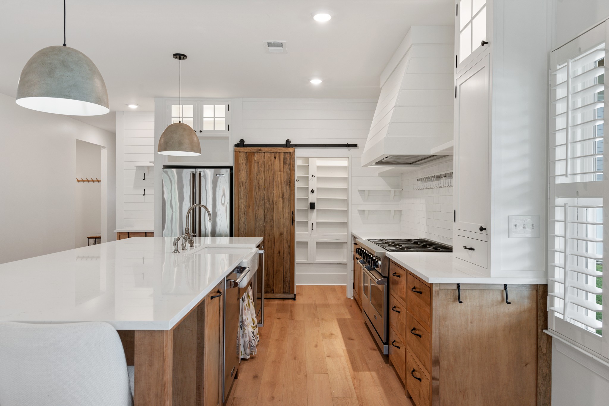 2056 Notchleaf Road Antioch, TN 37013 - Photo 8 of 42 a kitchen with stainless steel appliances a sink stove and refrigerator