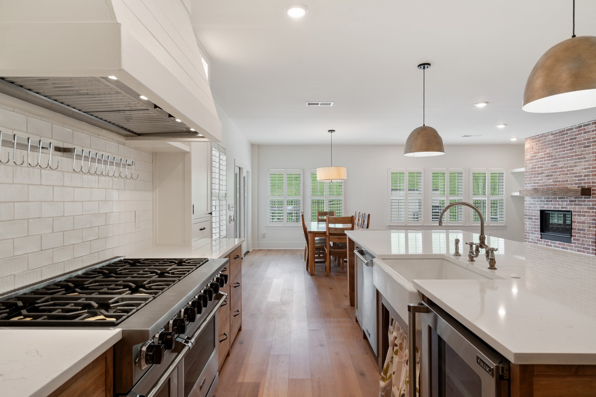 2056 Notchleaf Road Antioch, TN 37013 - Photo 9 of 42 a kitchen with counter top space a sink stainless steel appliances and cabinets