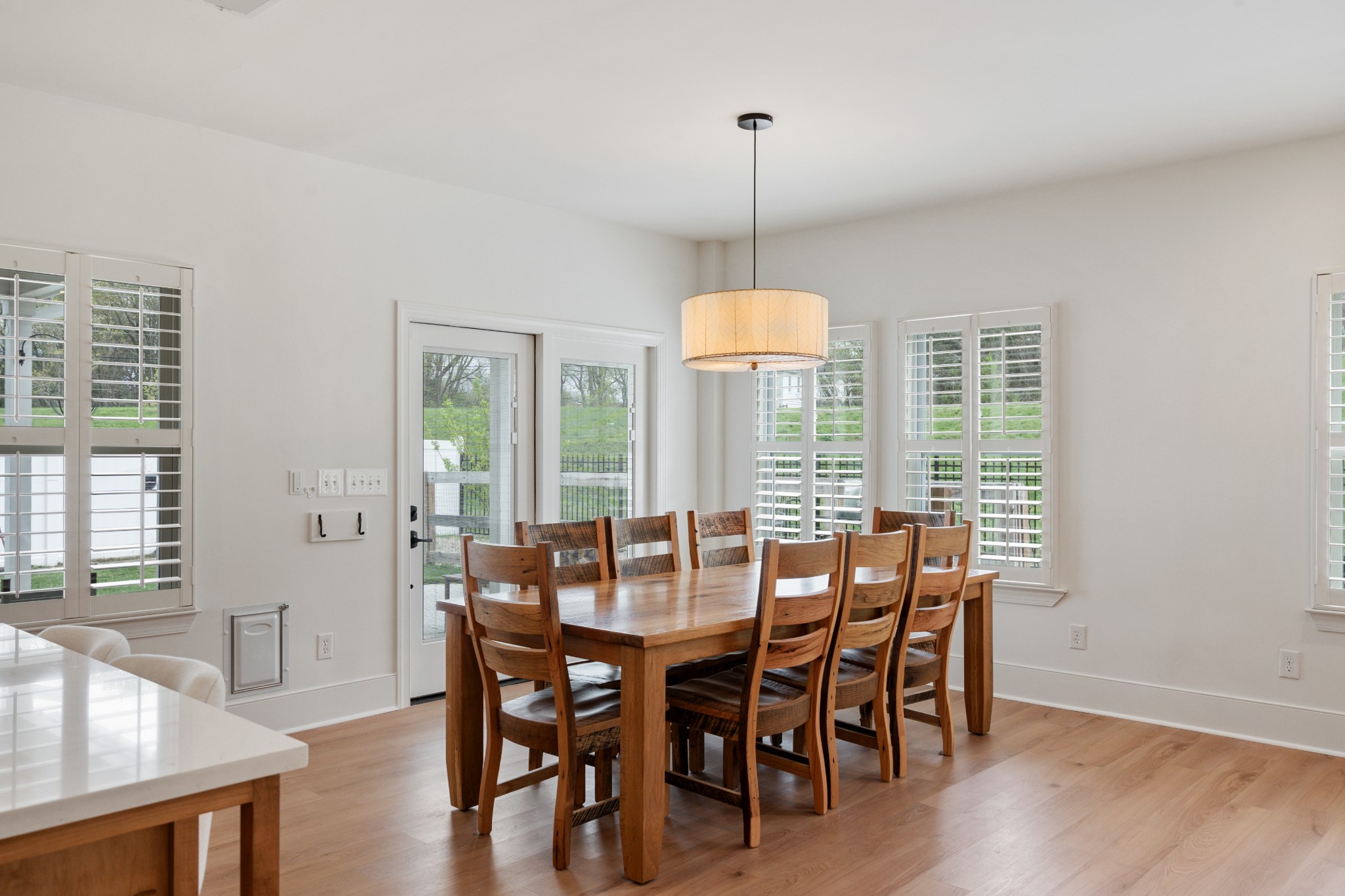 2056 Notchleaf Road Antioch, TN 37013 - Photo 10 of 42 a view of a dining room with furniture window and wooden floor
