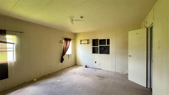 a view of a livingroom with a flat screen tv