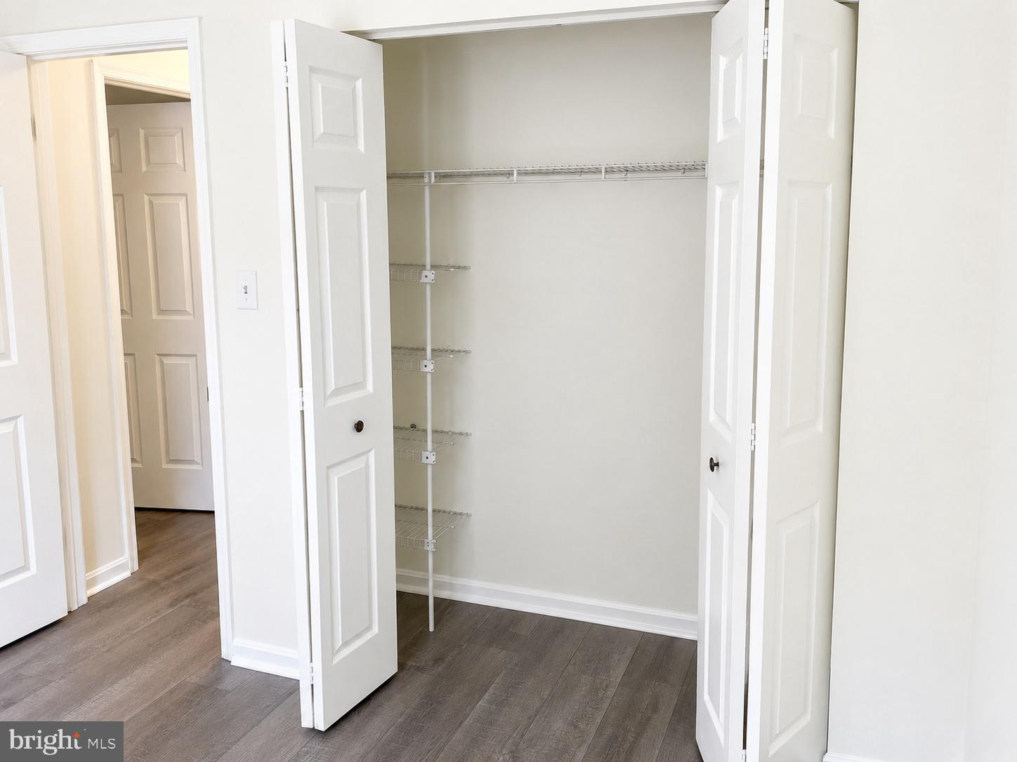 604 Moonglow Road, Unit 102 Odenton, MD 21113 - Photo 18 of 27 Spacious closet with double doors.