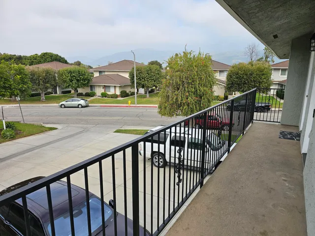 a view of a city from a balcony