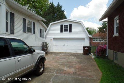 2 car garage with extra work shop above the garage