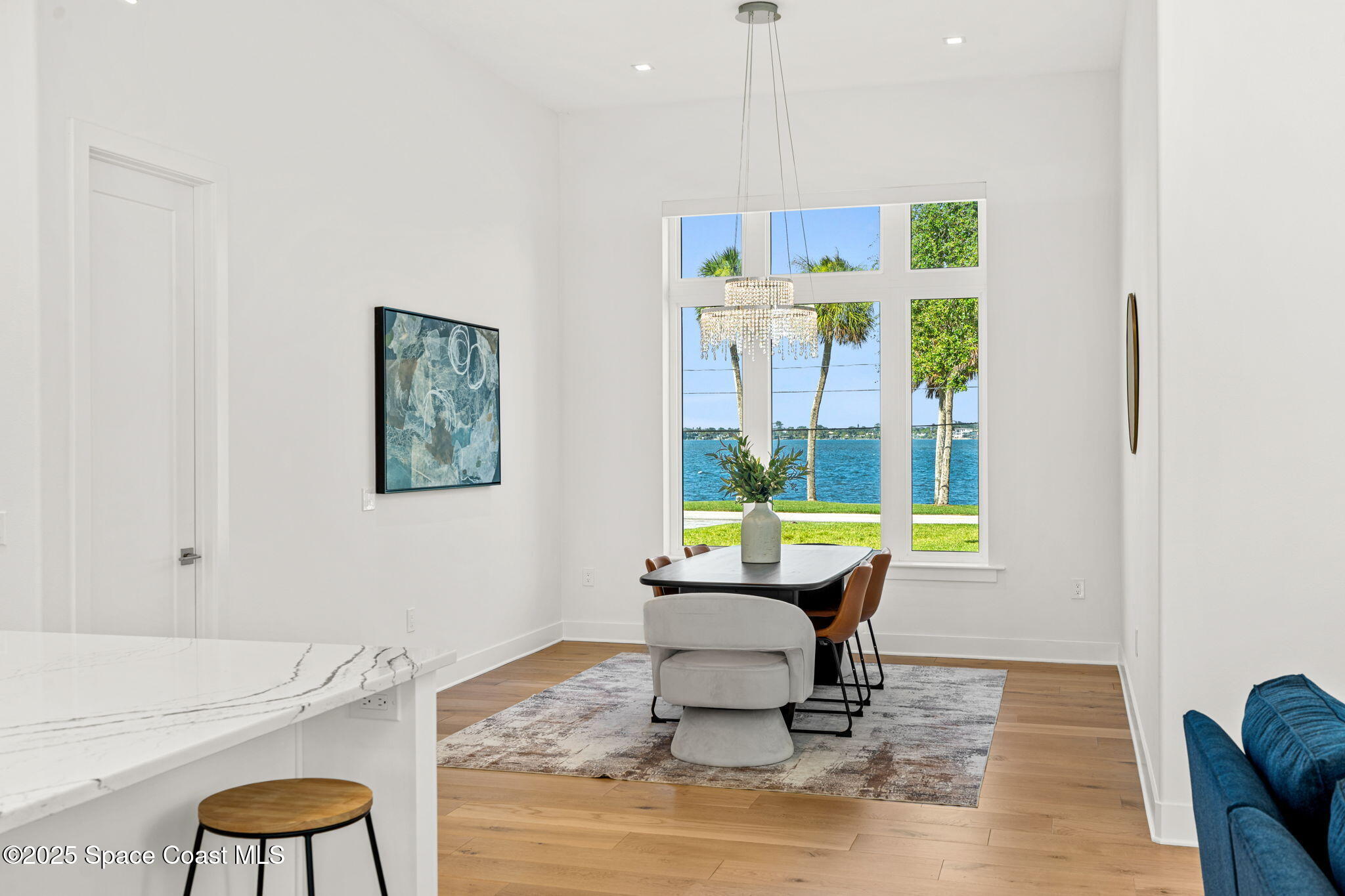 1949 Rockledge Drive Rockledge, FL 32955 - Photo 13 of 48 a view of a workspace with furniture window and wooden floor