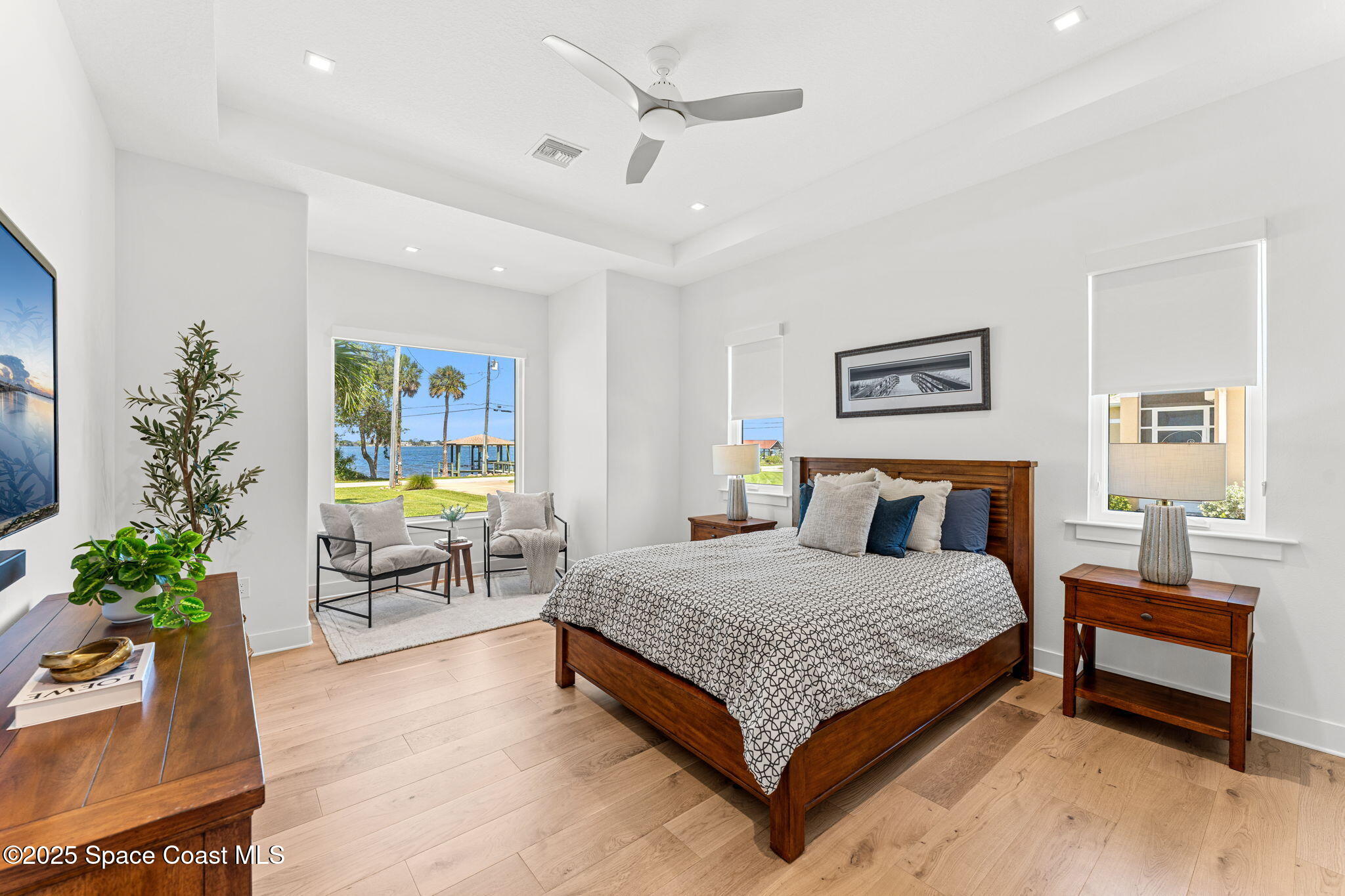 1949 Rockledge Drive Rockledge, FL 32955 - Photo 19 of 48 a bedroom with a bed and a table in it