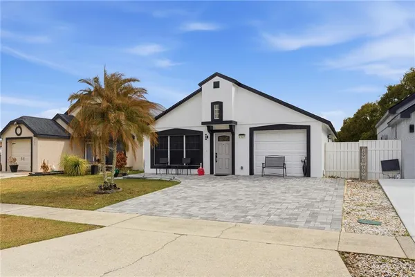 a view of a house with entertaining space