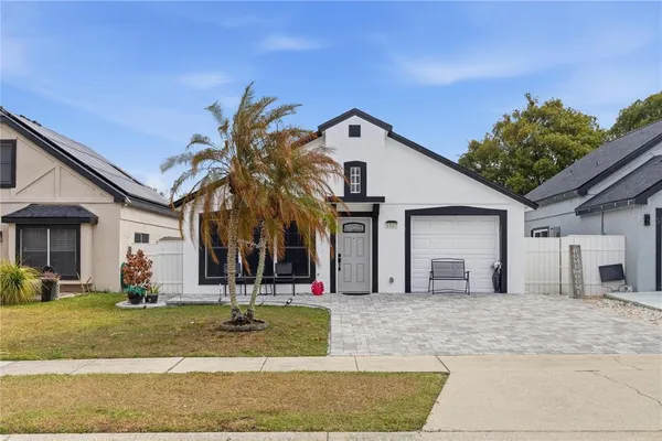 a view of a house with entertaining space