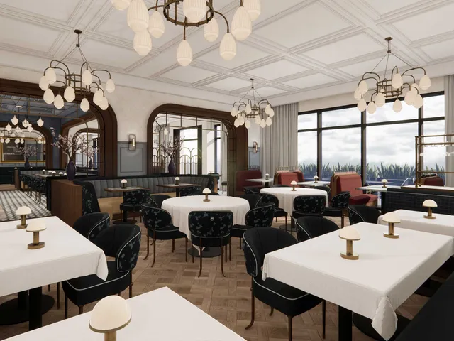 a dining room with stainless steel appliances kitchen island granite countertop a dining table chairs and a refrigerator