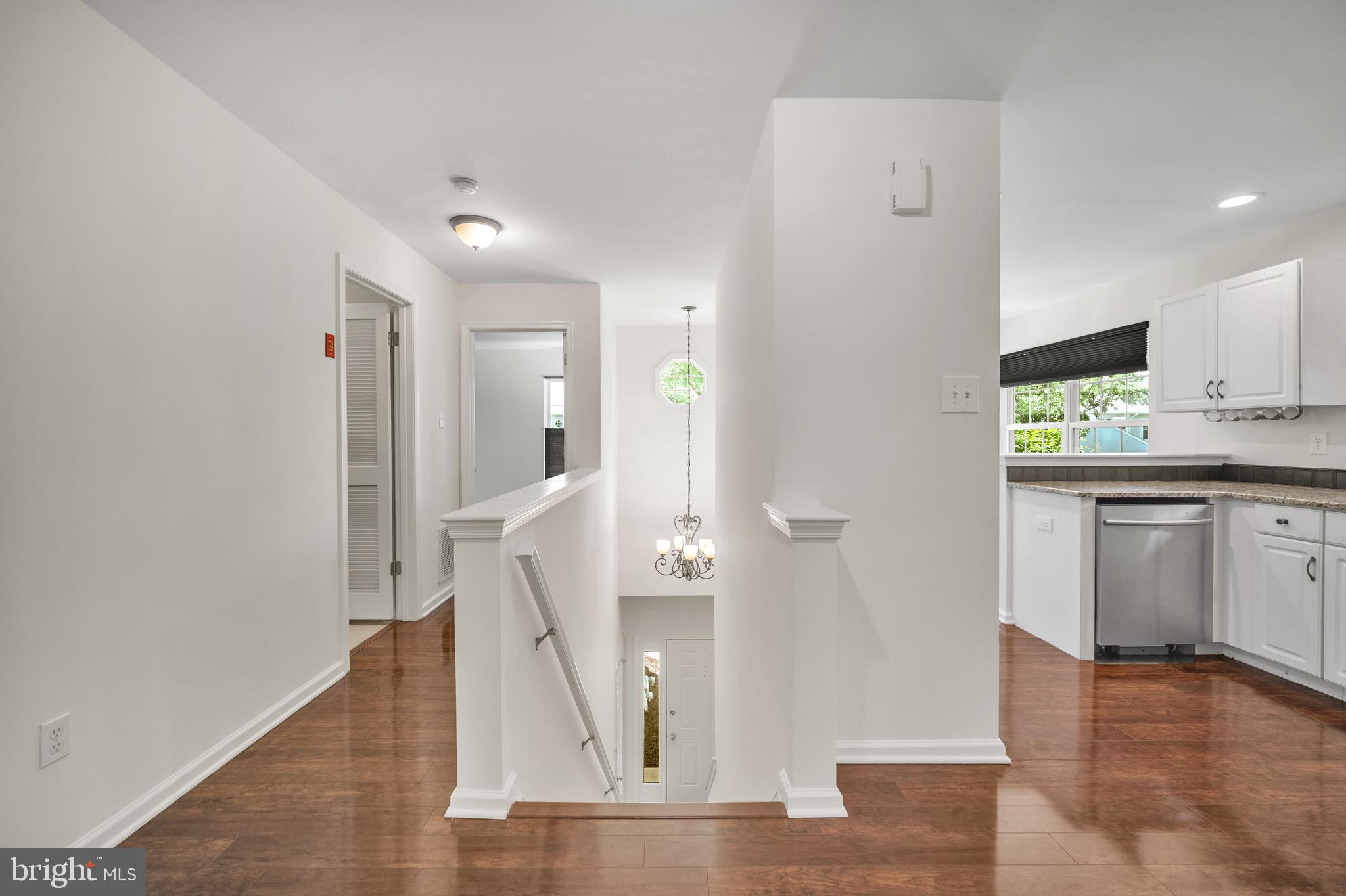 2402 Waterford Road, Unit 94 Yardley, PA 19067 - Photo 12 of 28 a view of a kitchen cabinets and wooden floor