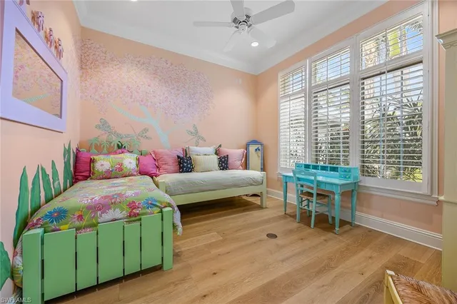 a bedroom with a bed and a table