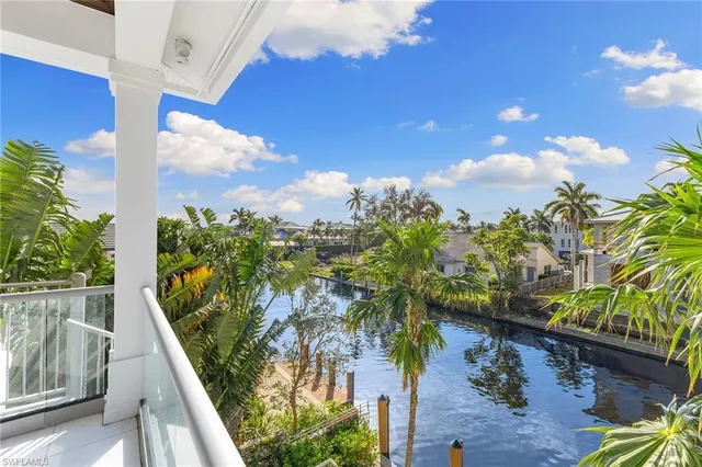 a view of balcony with wooden floor