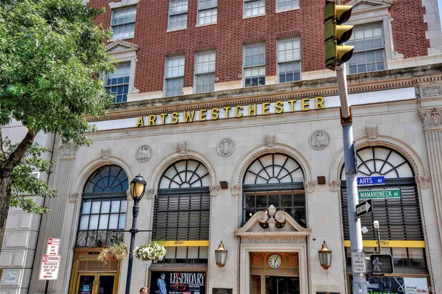 a front view of a building with street view