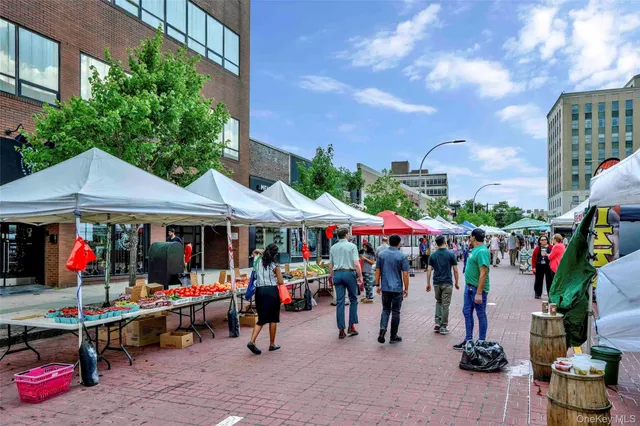 a front view of a building with glass windows and door