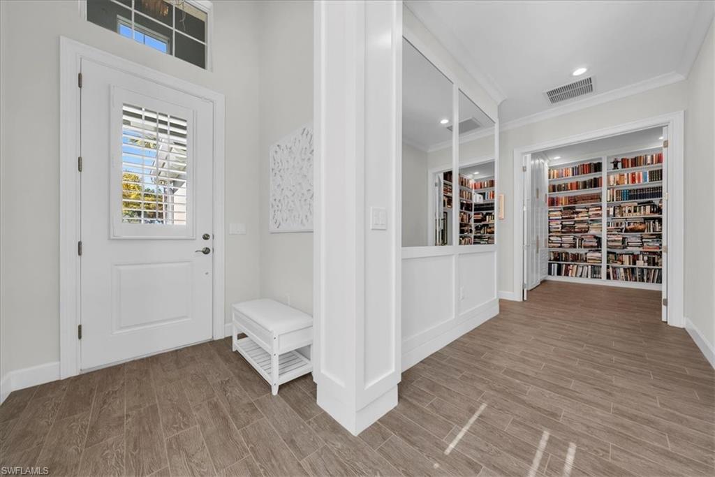 5756 Elbow Avenue Naples, FL 34113 - Photo 21 of 45 Full bathroom with double vanity, a shower stall, recessed lighting, and light tile patterned flooring