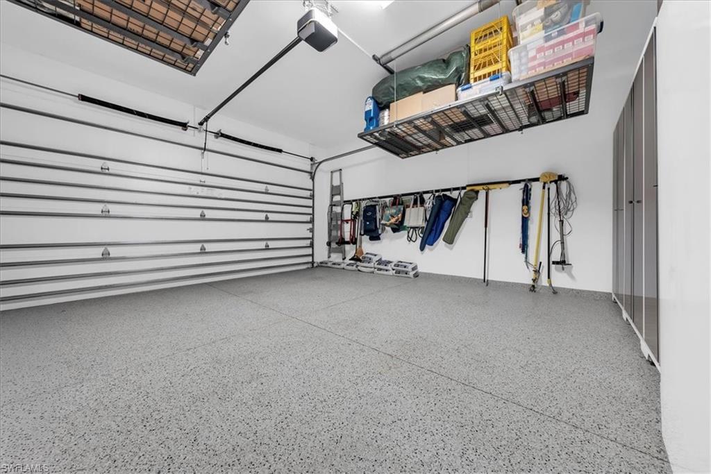 5756 Elbow Avenue Naples, FL 34113 - Photo 27 of 45 Bedroom with wood tiled floors and a ceiling fan