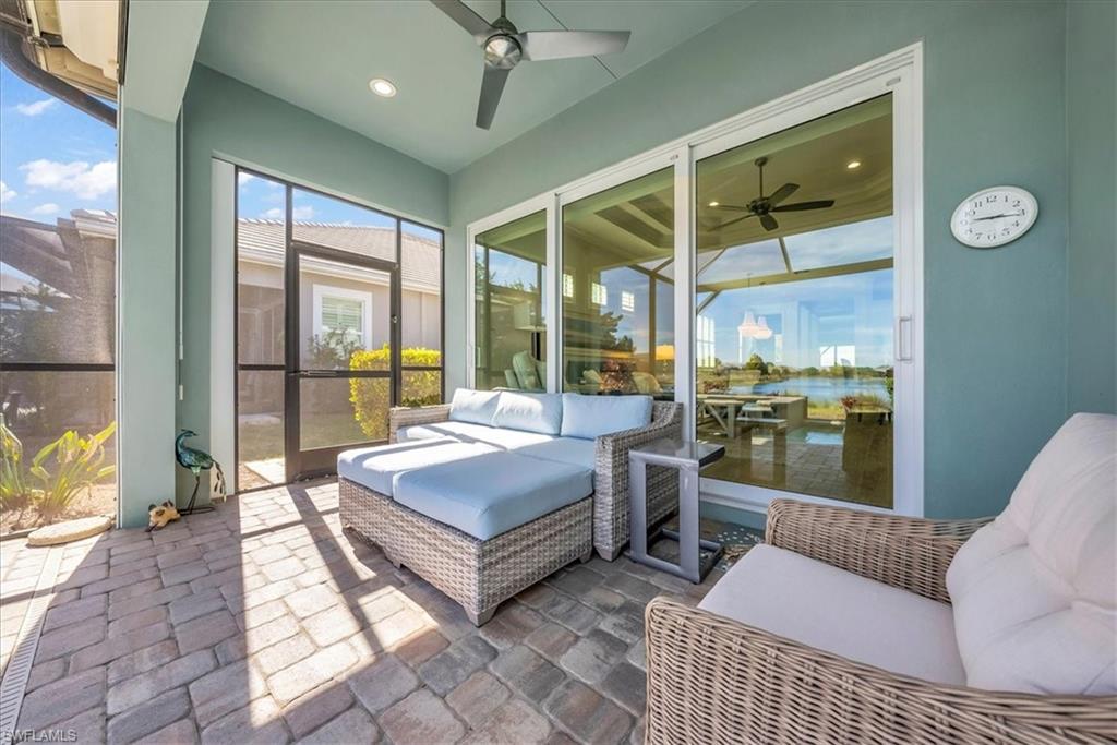 5756 Elbow Avenue Naples, FL 34113 - Photo 29 of 45 Sunroom with a patio, ceiling fan, and outdoor lounge area