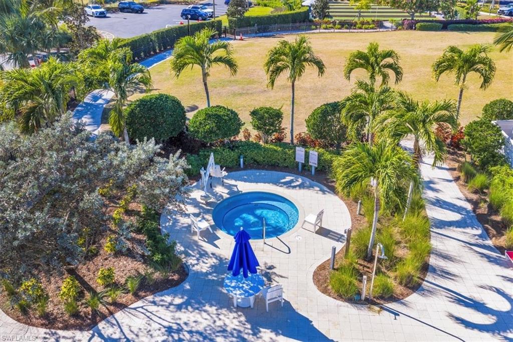 5756 Elbow Avenue Naples, FL 34113 - Photo 42 of 45 View of front of house with a tile roof, decorative driveway, stucco siding, and a garage