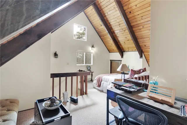 front view of a house with a bench