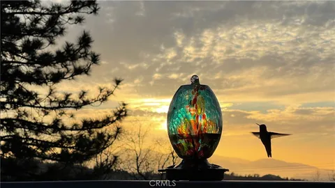 a view of a house with a park