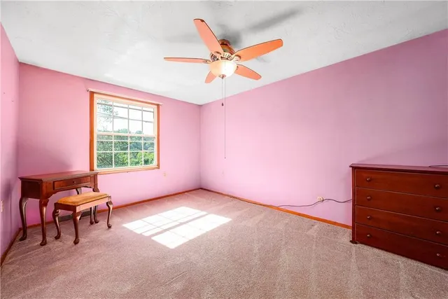 a workspace with furniture and window