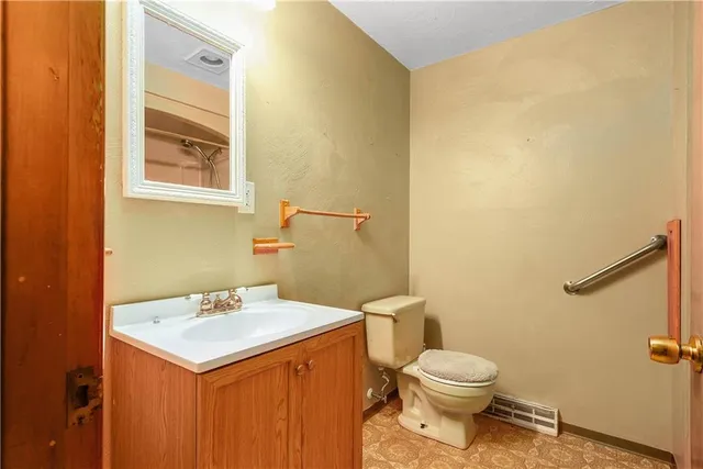 a bathroom with a sink and a toilet