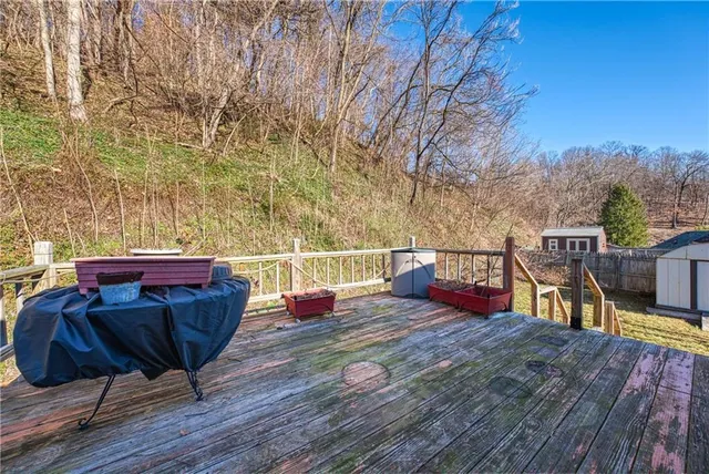 a view of a balcony with chairs