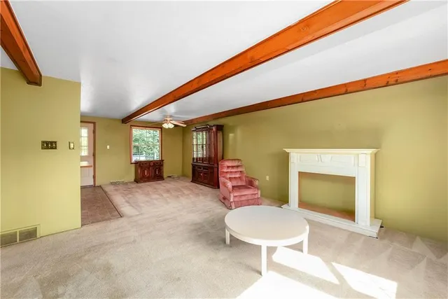 a bathroom with a sink mirror vanity and toilet