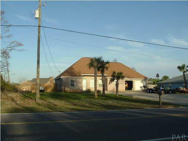 5600 Bauer Road, Unit LT 92 Pensacola, FL 32507 - Photo 4 of 4 Existing home next door to Lot 91