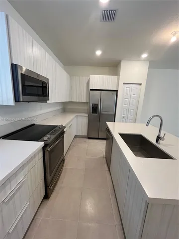 $690,000 | 4935 Northwest 84th Avenue, Doral, FL 33166